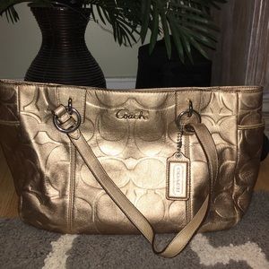 Coach bag metallic gold with purple satin lining